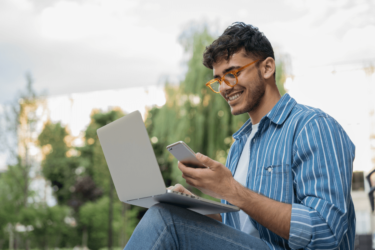 Gen-Z with laptop and mobile phone