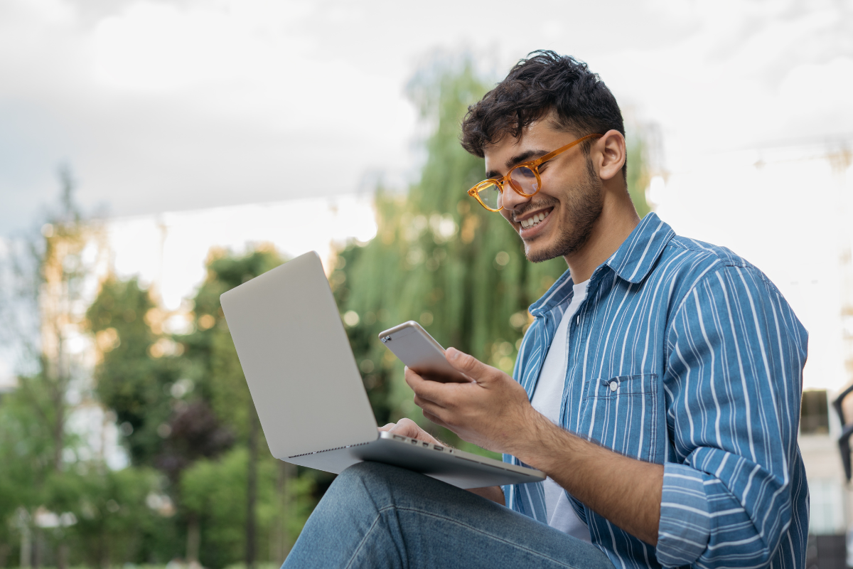 Gen-Z with laptop and mobile phone